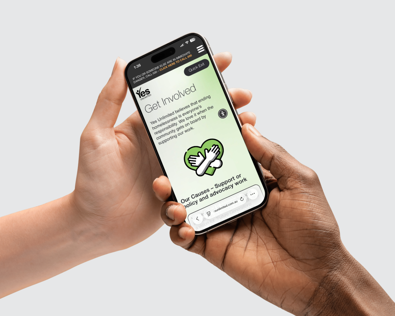 Four phones are sitting on top of each other on a table.