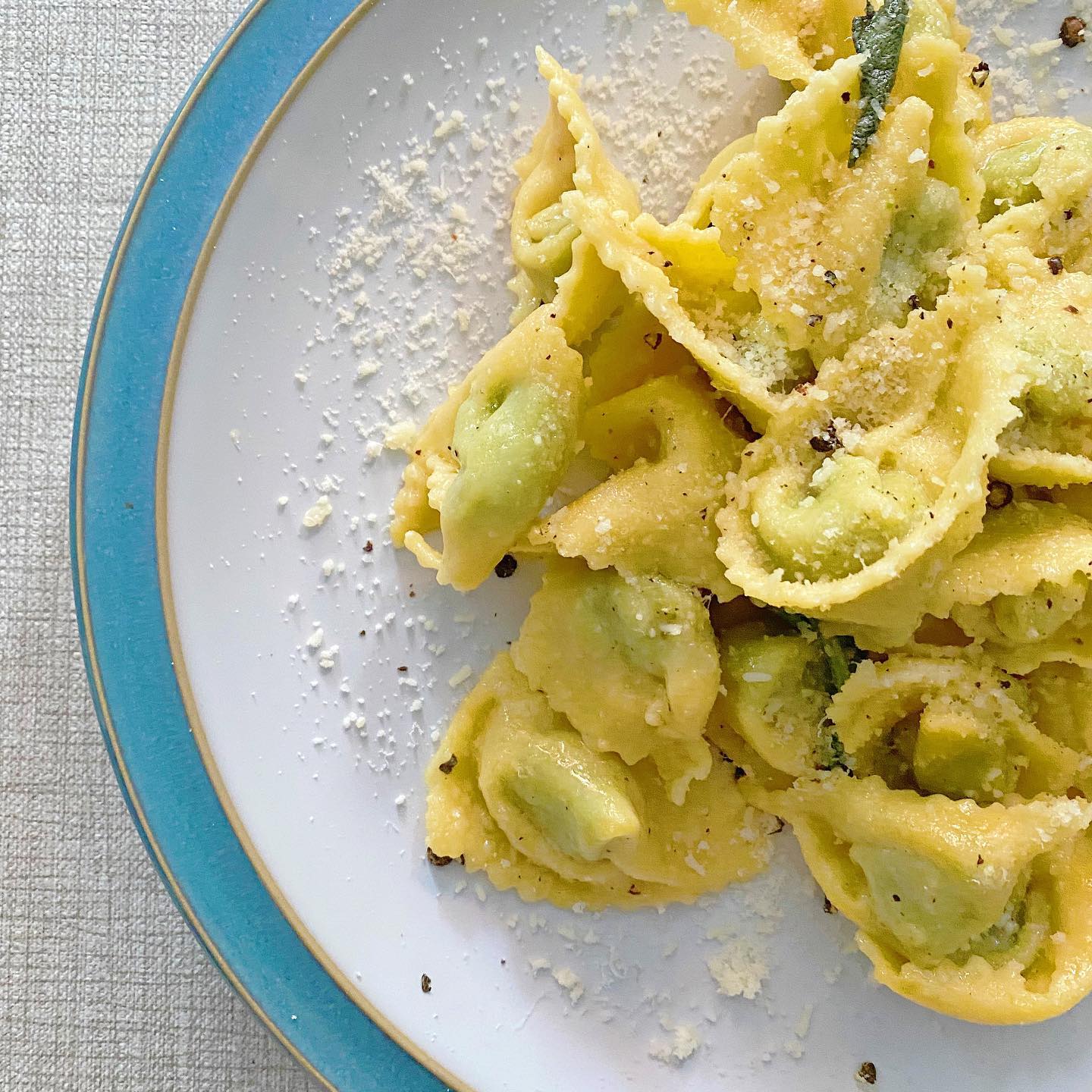 A close up of a plate of pasta on a table