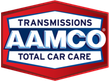 AAMCO logo: red hexagon frame with a blue and white text reading "TRANSMISSIONS AAMCO TOTAL CAR CARE".