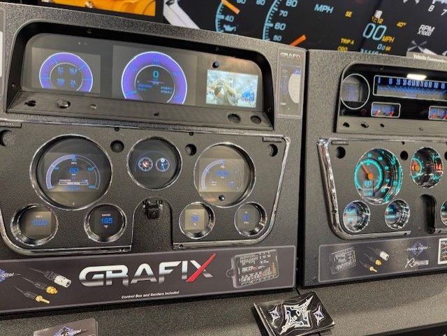 Dashboard displays with blue and chrome gauges. 