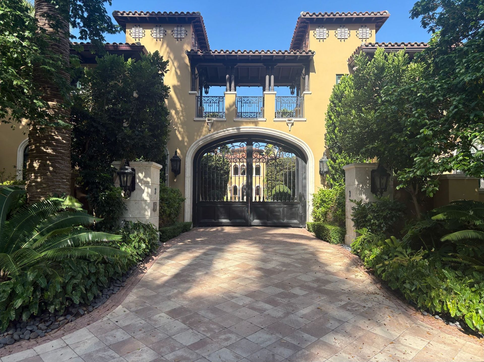 Gated waterfront mansion seen during the Star Island drive-by on the Miami 4 Stop City Tour
