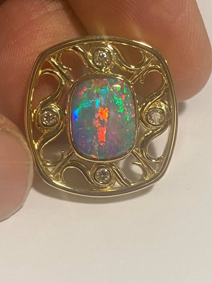 Gold Pendant With a Vibrant Opal and Diamonds — Regency Jewellers in Cairns City, QLD