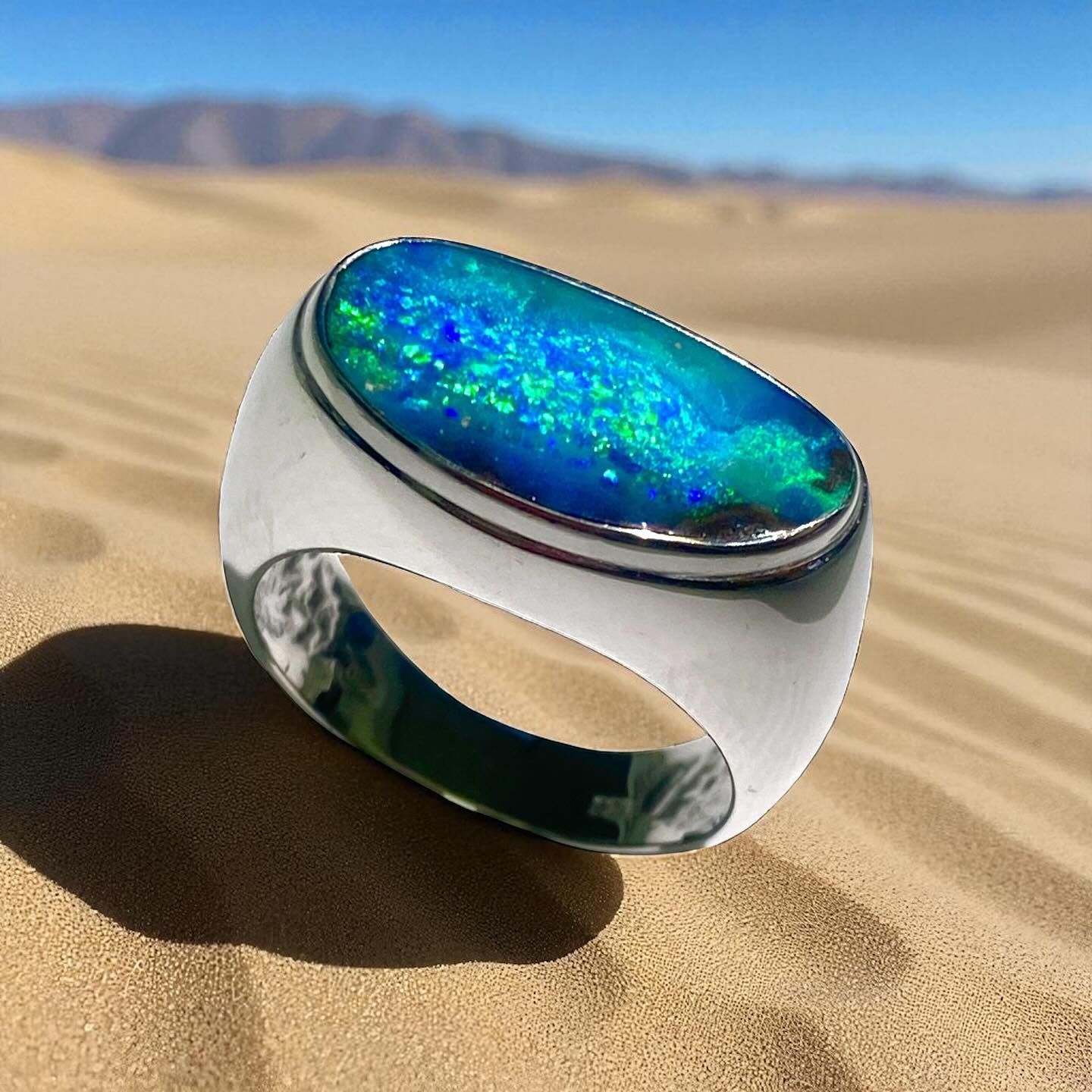 Silver Ring With Large Oval Opal Stone — Regency Jewellers in Cairns City, QLD