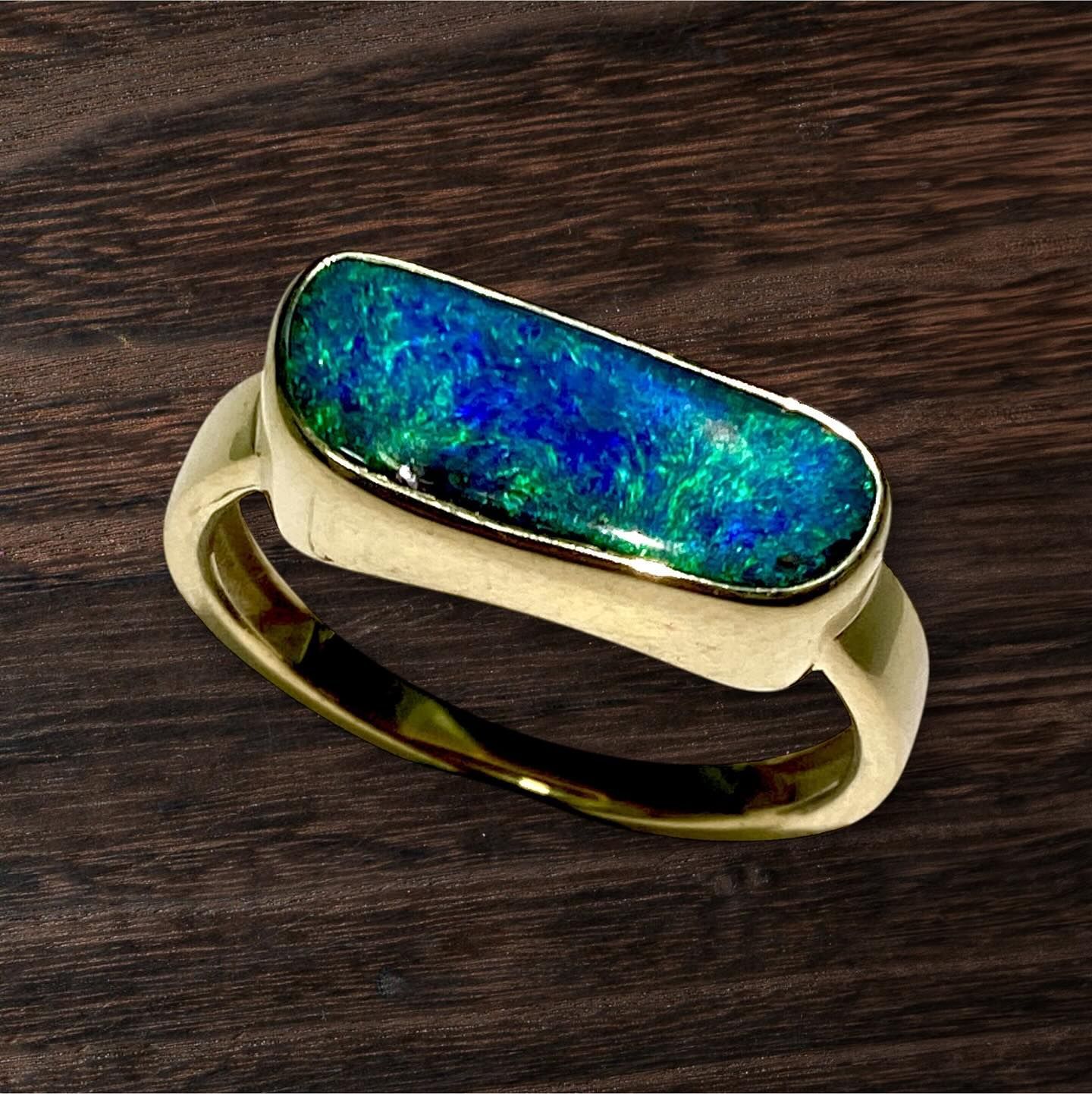 Gold Ring With a Rectangular, Iridescent Blue-green Opal — Regency Jewellers in Cairns City, QLD