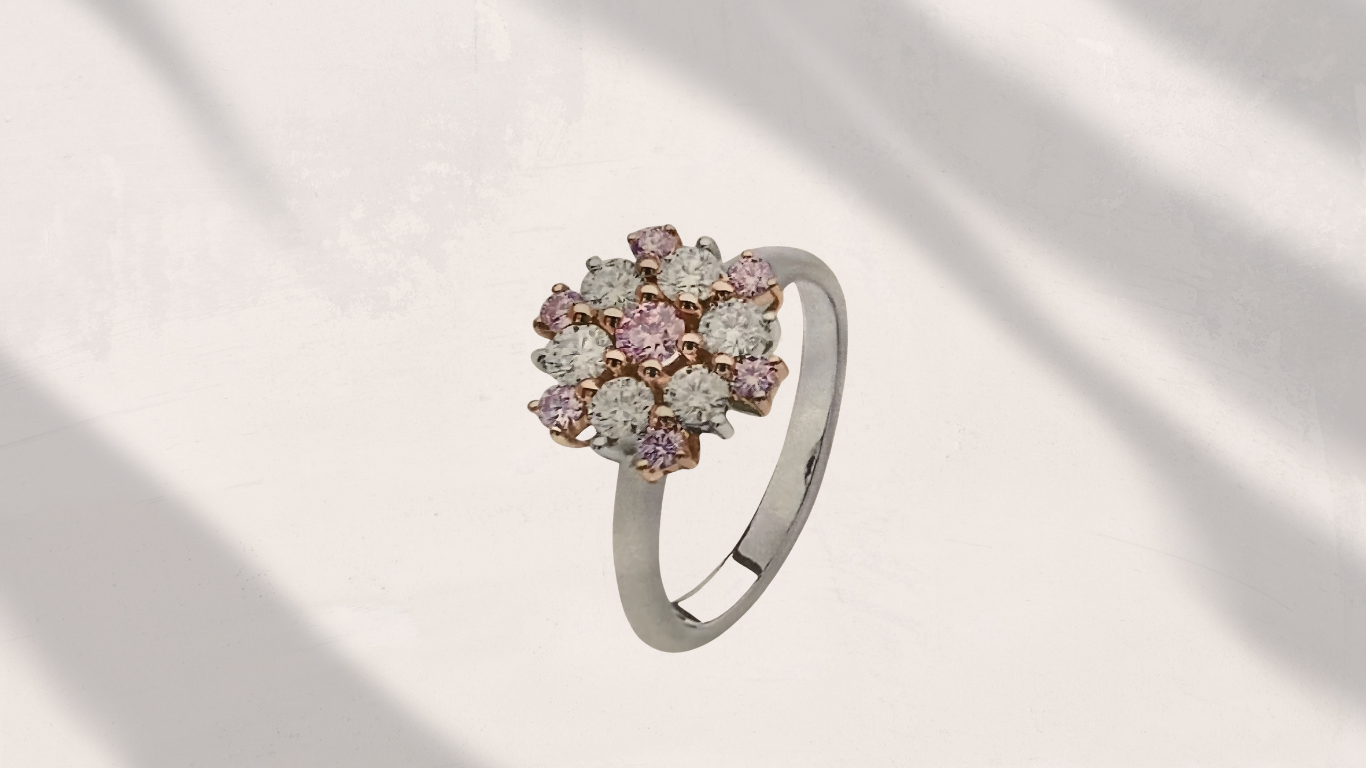 Pink Gemstone on a Textured White Surface, Casting a Shadow in Sunlight — Regency Jewellers in Cairns City, QLD