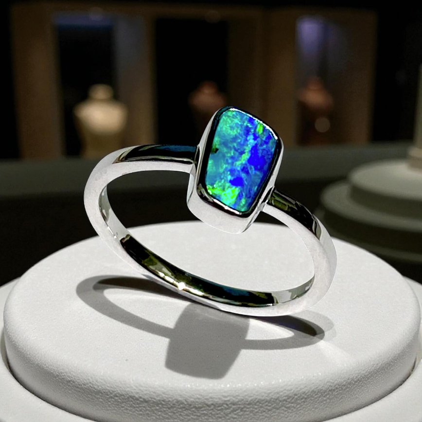 Diamond Ring on a Wooden Display — Regency Jewellers in Cairns City, QLD