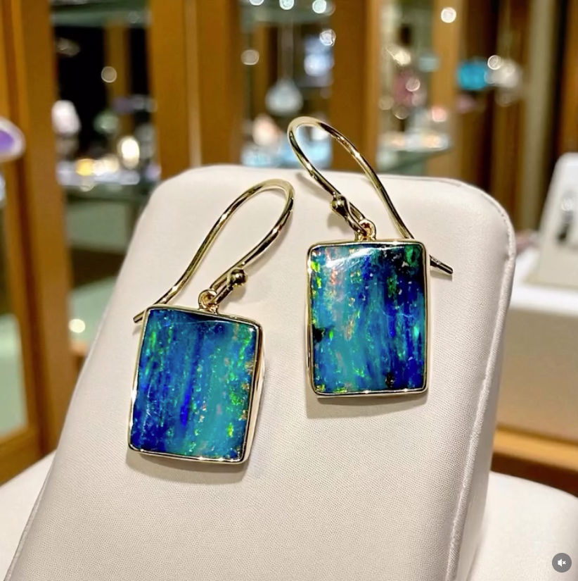 Amber Teardrop Earrings on a Silver Display Stand — Regency Jewellers in Cairns City, QLD