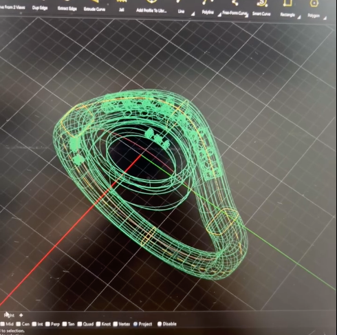 Person Wearing a Bandana and Red Plaid Shirt Works on Jewelry at a Workbench — Regency Jewellers in Cairns City, QLD