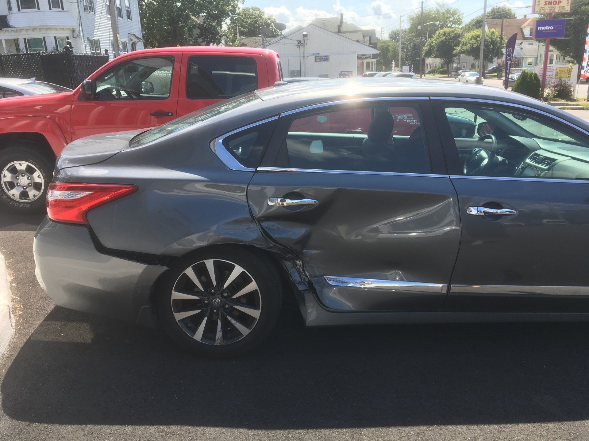 Motorcycle Painting — Before Car Dent Damage in Pawtucket RI