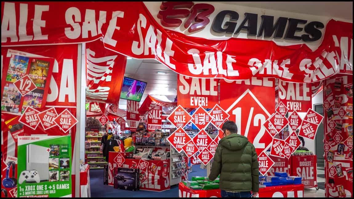 EB Games store interior, heavily decorated with 