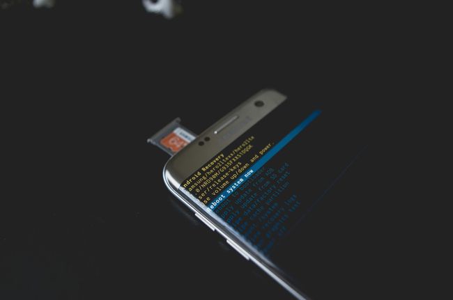A cell phone with a sd card plugged into it