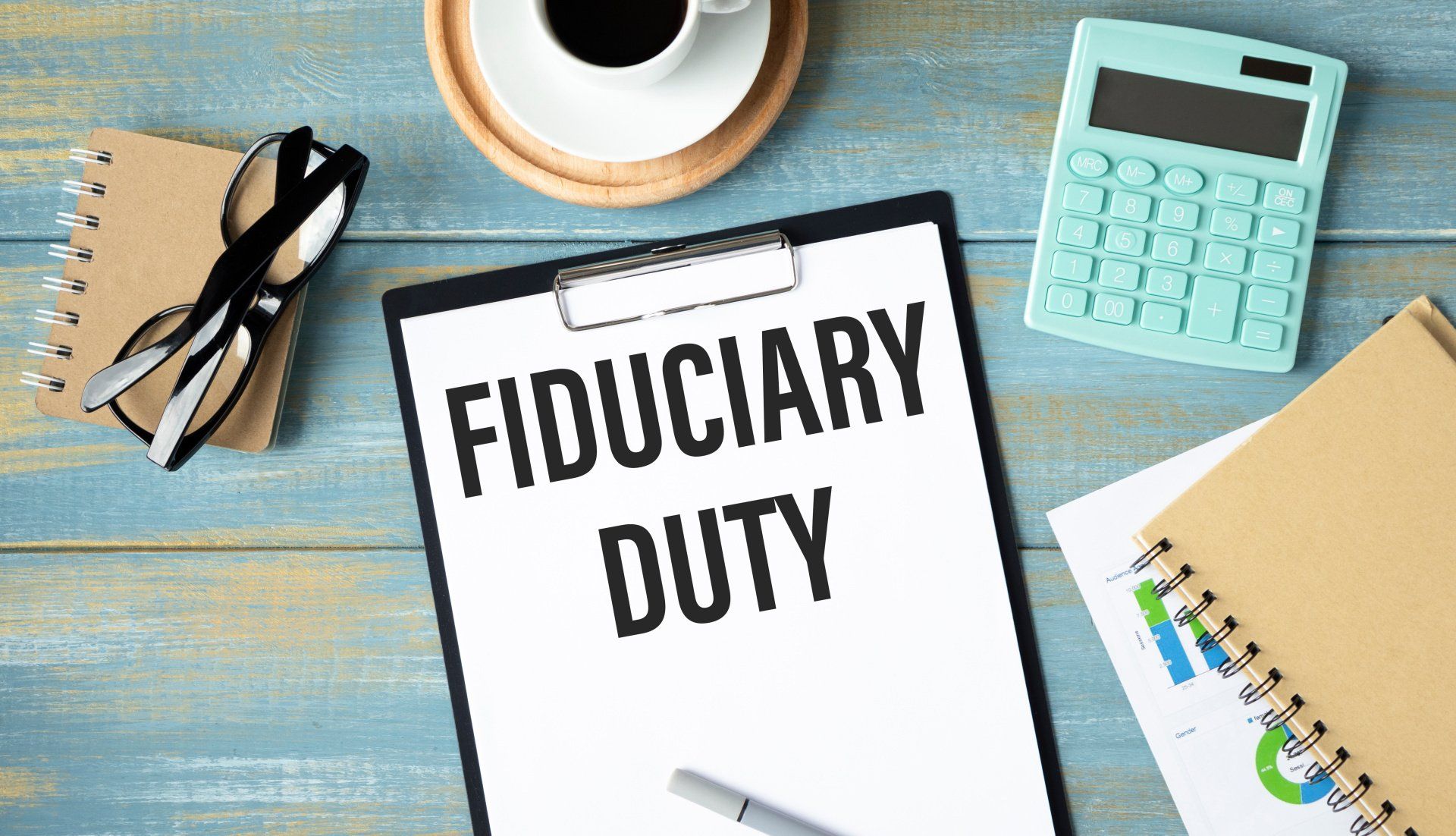 A clipboard with the words `` fiduciary duty '' written on it is sitting on a wooden table.