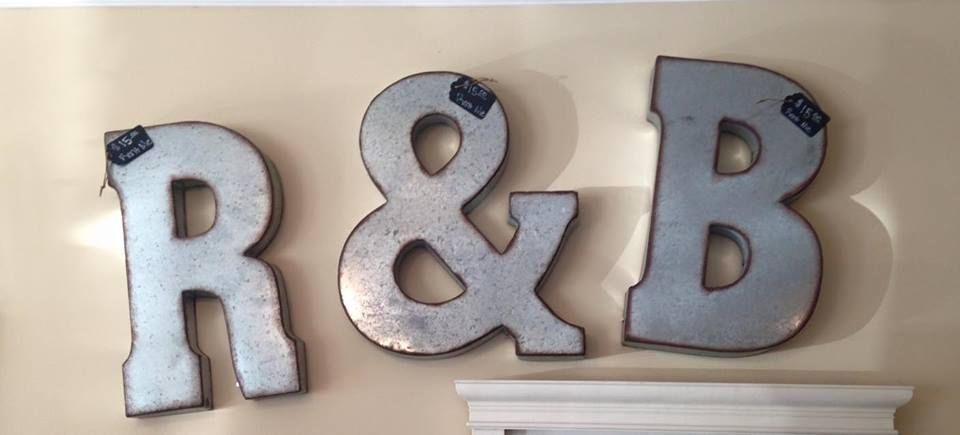The letters r and b are hanging on a wall