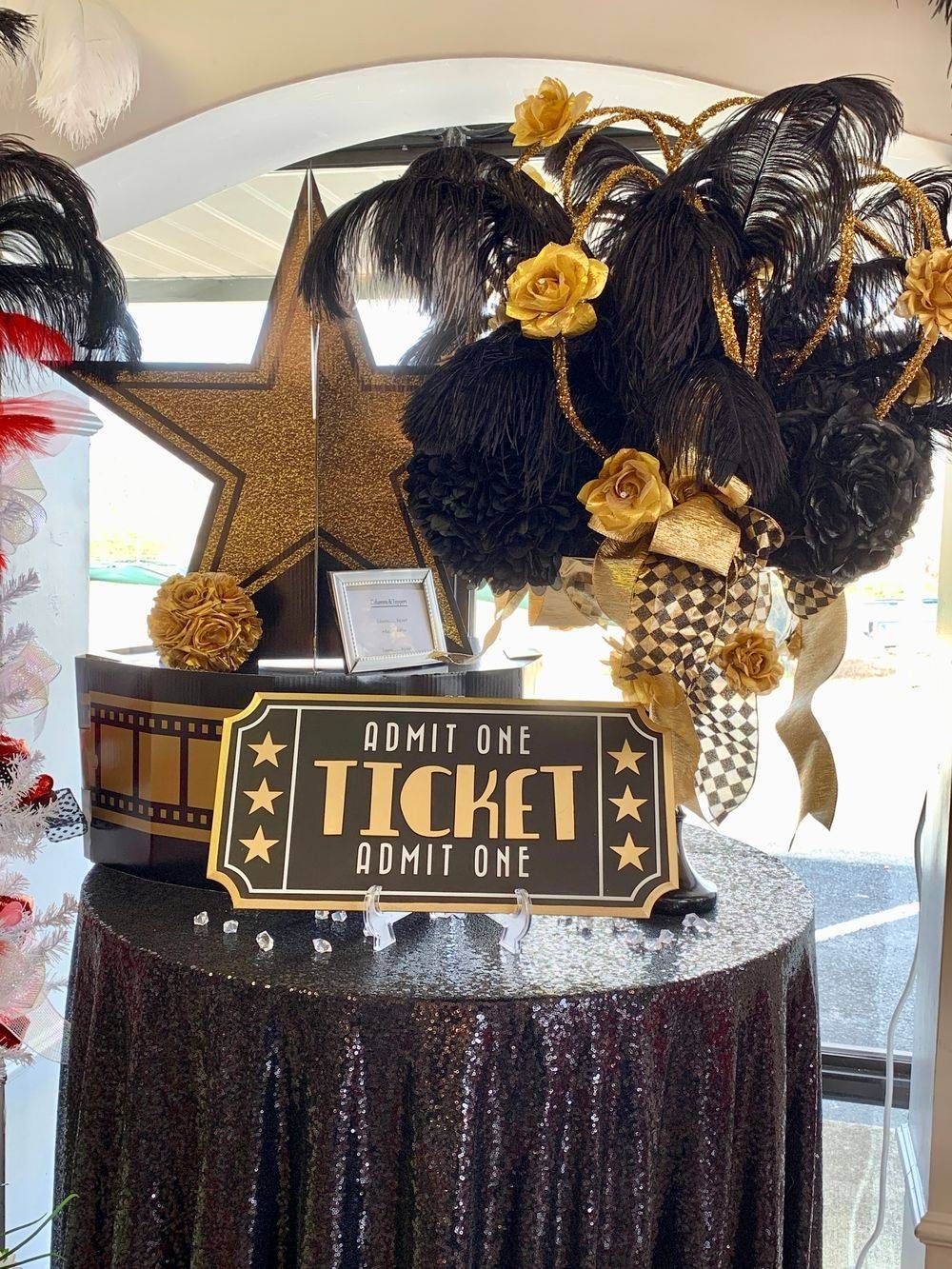 A ticket sign is sitting on top of a table.