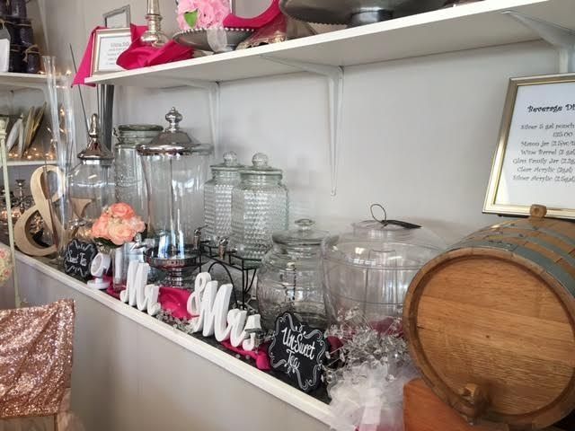 A shelf with jars and a sign that says mr. and mrs.