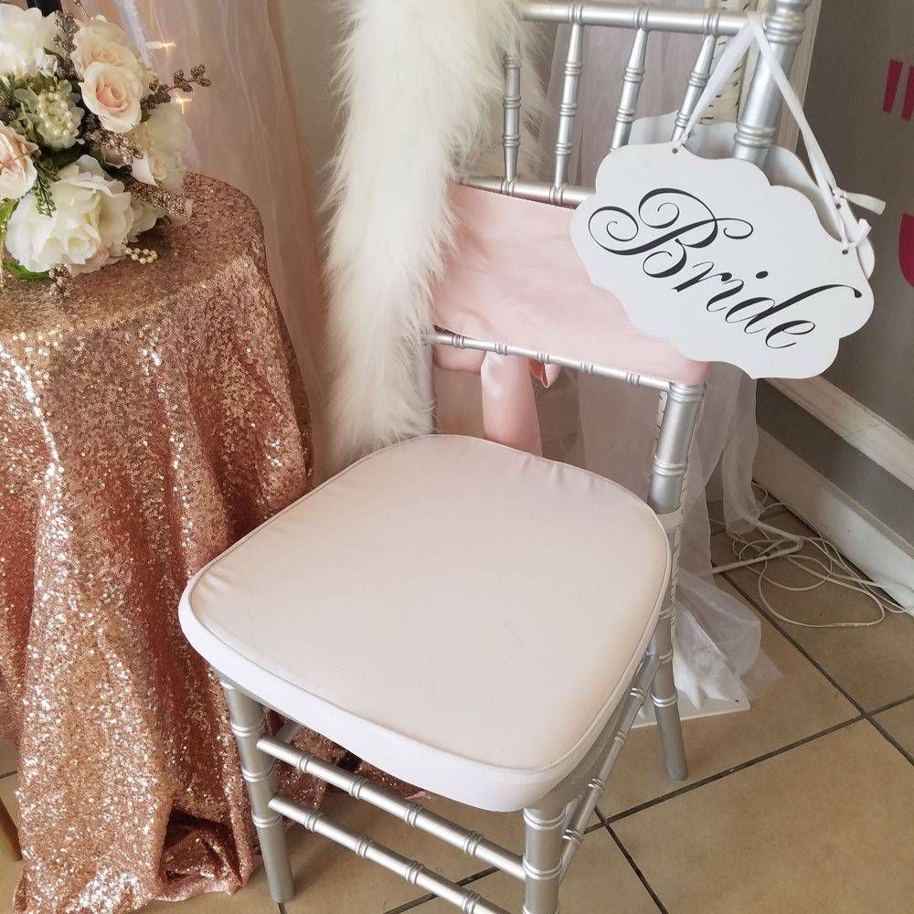 A chair with a sign on it that says bride