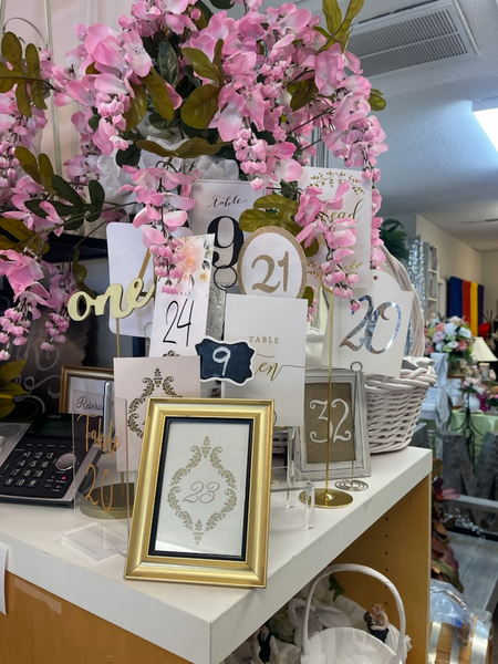 A table with a bunch of table numbers on it