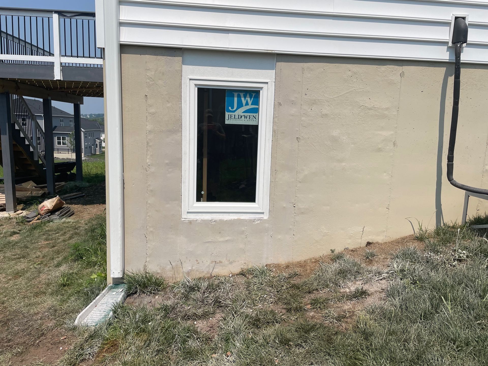 A house with a window on the side of it.