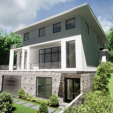 A large house with a lot of windows and a garage