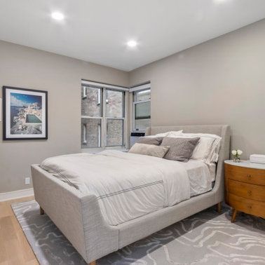 There is a large bed in the middle of the room.