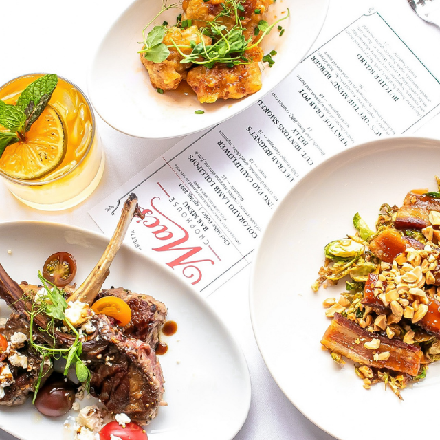 A plate of food next to a menu that says mac 's