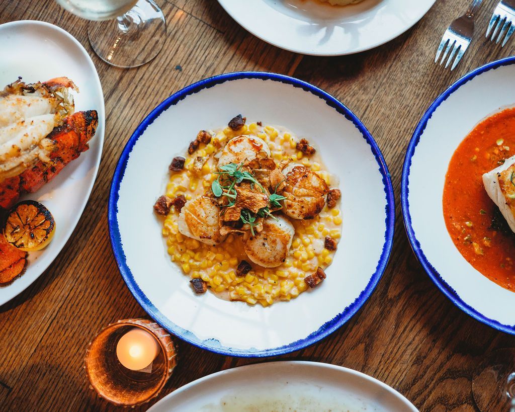 Scallop and Corn Dish with Lobster on a table