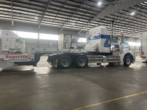 White Semi-Truck With Trailer Inside a Large Warehouse — Supertilt Brisbane In Bracken Ridge, QLD