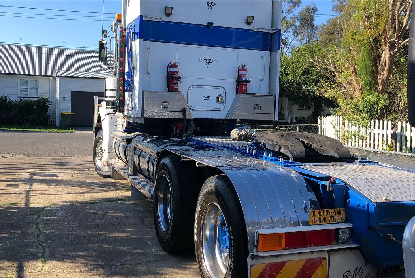 Rear View of a White and Blue Semi-truck Parked on a Road — Supertilt Brisbane In Yatala, QLD