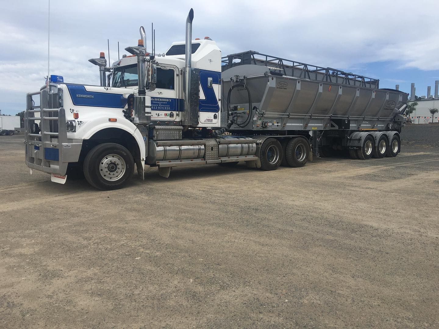 White and Blue Semi-truck With a Silver Hopper Trailer — Supertilt Brisbane In Logan, QLD