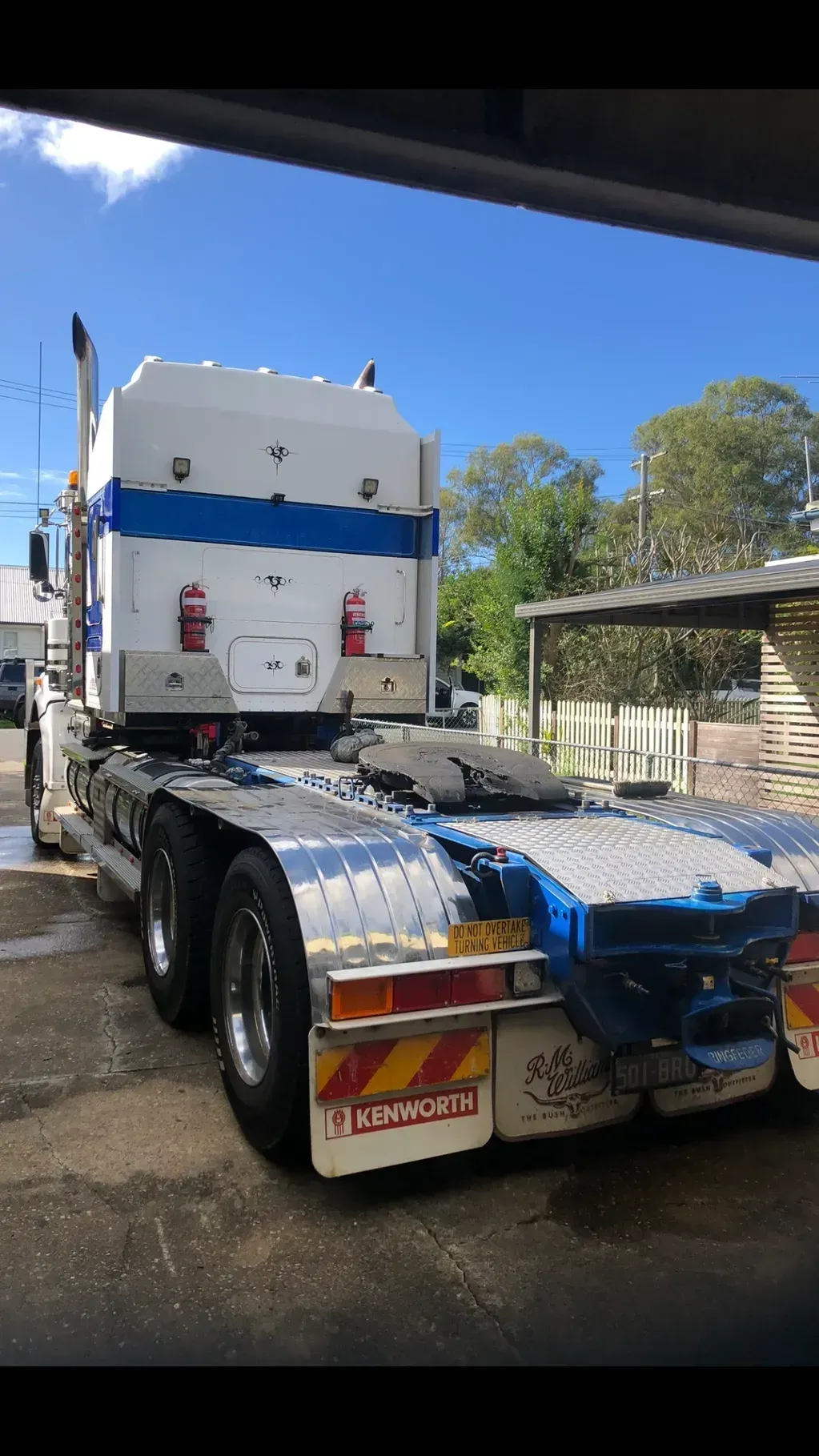 Rear View of a White Semi-truck With Blue Stripes — Supertilt Brisbane In Bracken Ridge, QLD