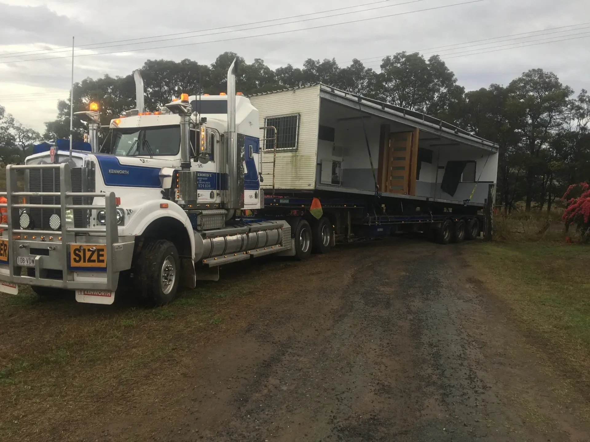 White and Blue Semi-truck on a Muddy Road — Supertilt Brisbane In Bracken Ridge, QLD