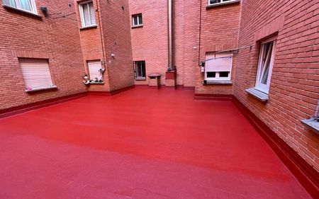 impermeabilización de patio interior en comunidad de vecinos con clorocaucho en parla, madrid