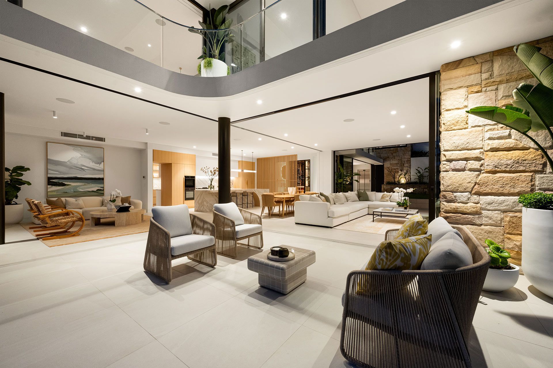 A living room with a lot of furniture and a table. Balmoral, Mosman.