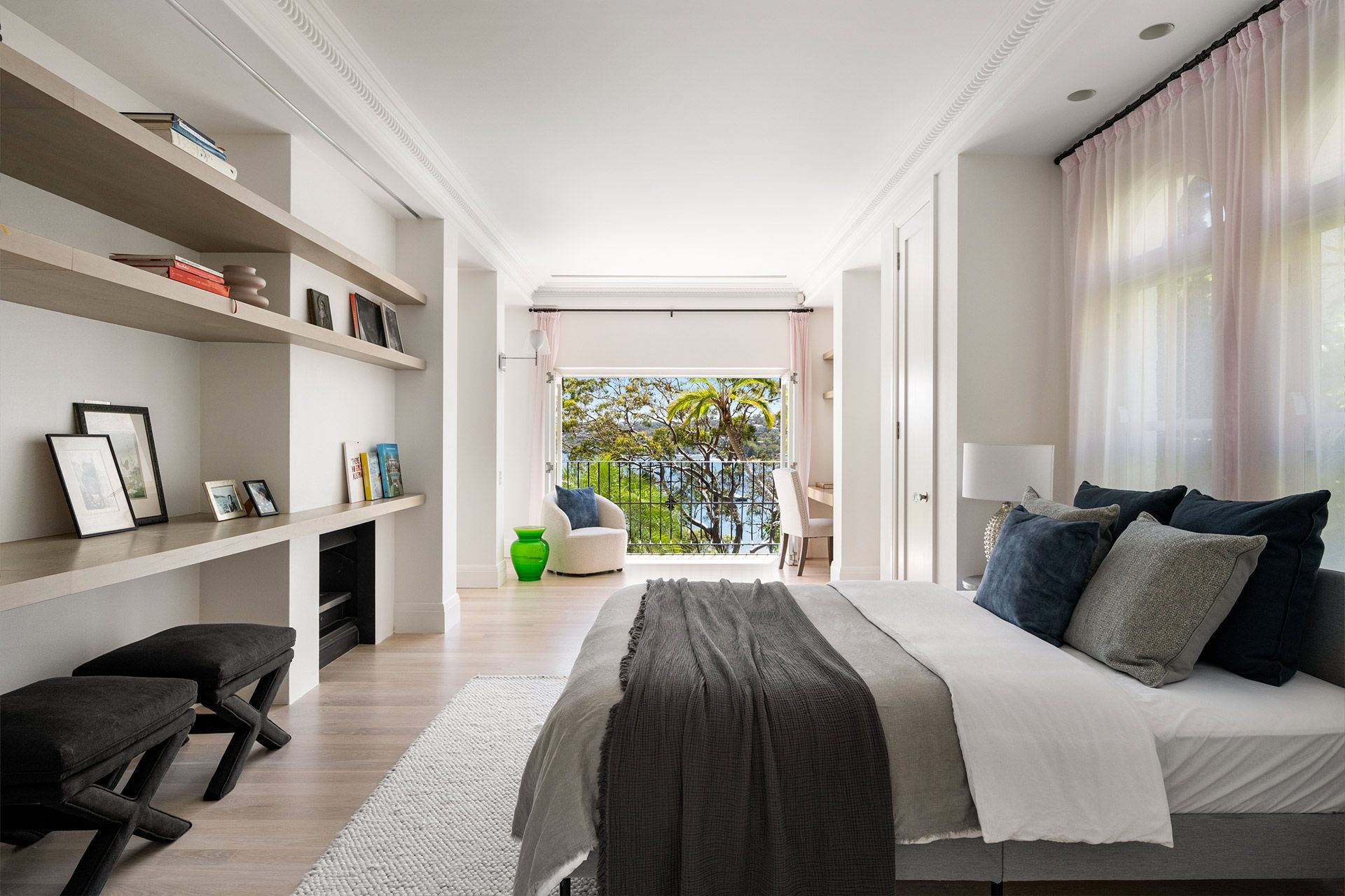 There is a large bed in the middle of the room.