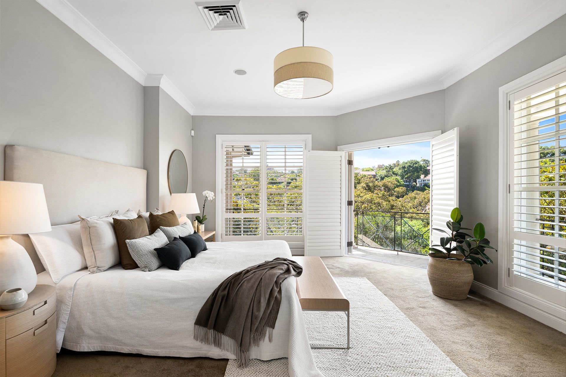 There is a large bed in the middle of the room.