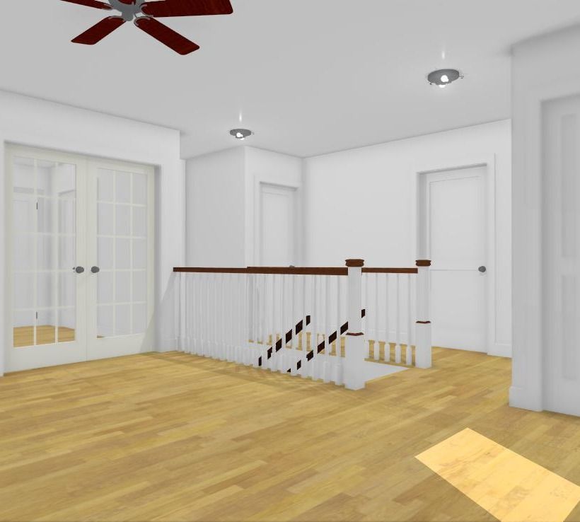 A ceiling fan is hanging from the ceiling above a staircase