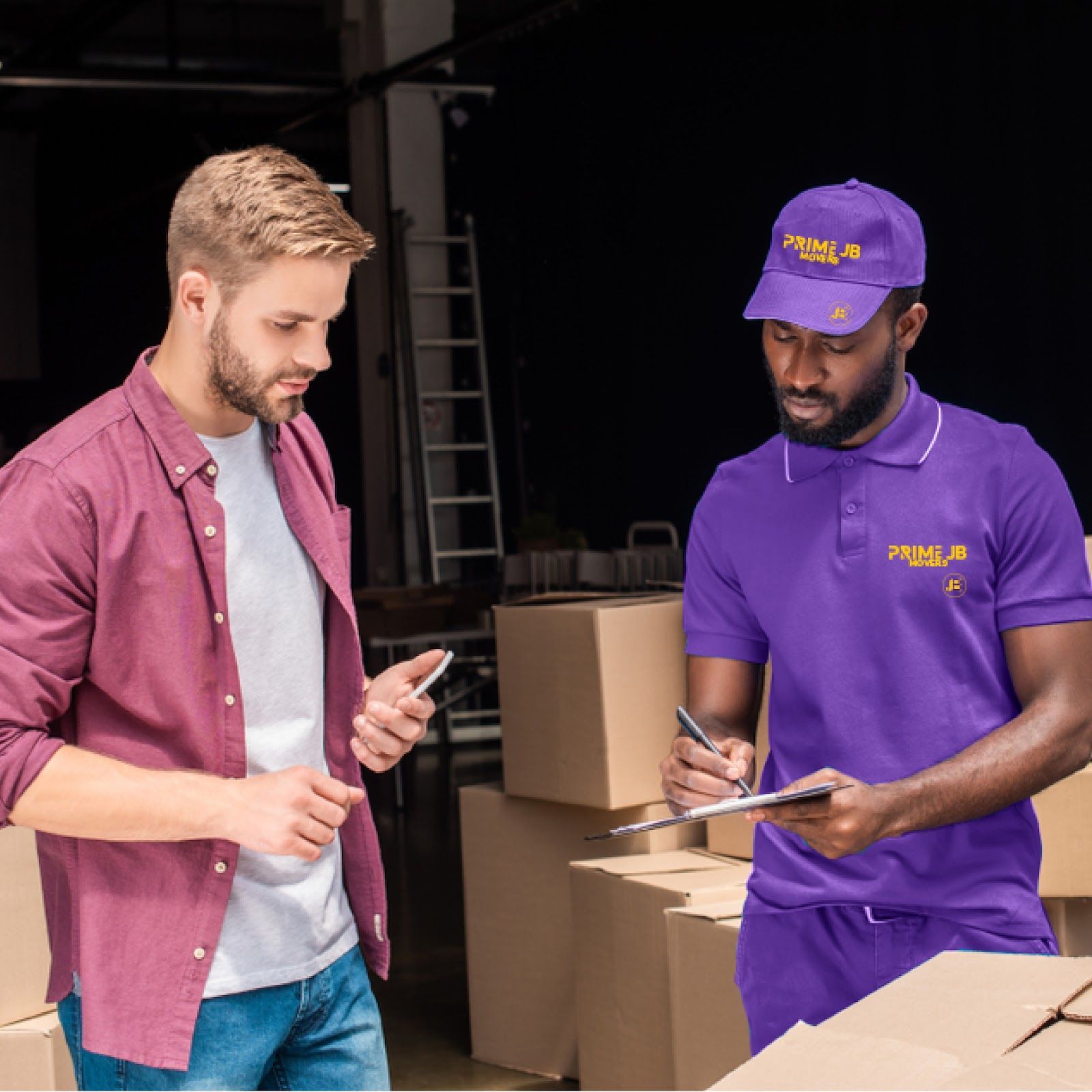 A man wearing a purple shirt with the word pack on it