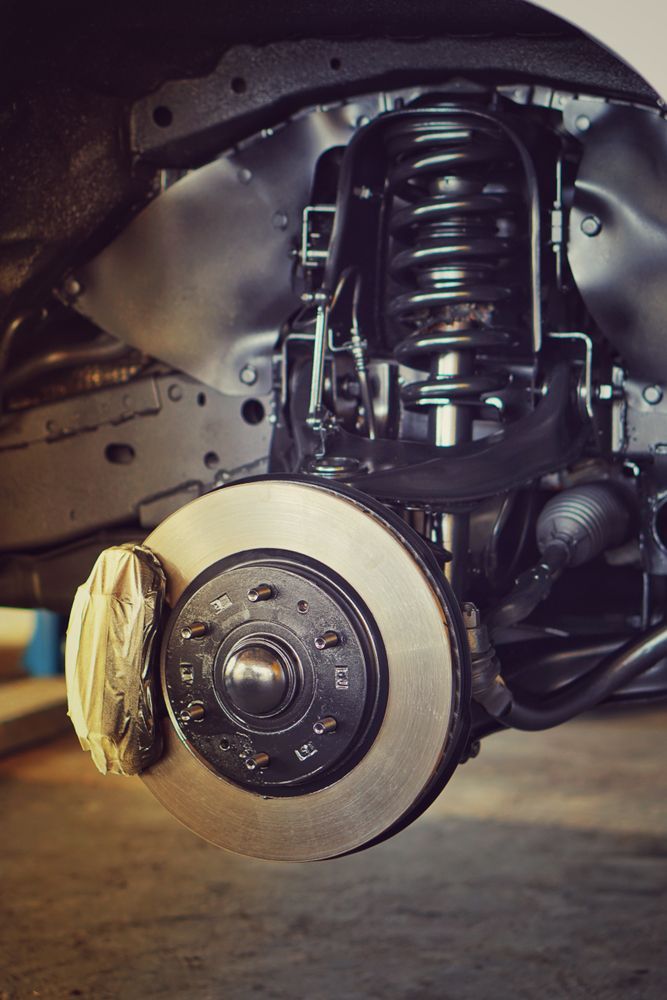Close Up Of A Car Suspension And Brake System — SAE Automotive in Mitchell, ACT