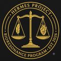 Gold Hermes Project emblem with scales, feather, heart, and circular text on a black background