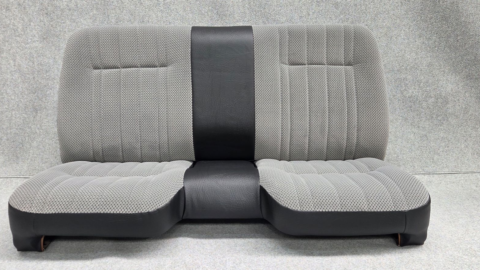 Bench seat with grey automotive velour and black long grain vinyl