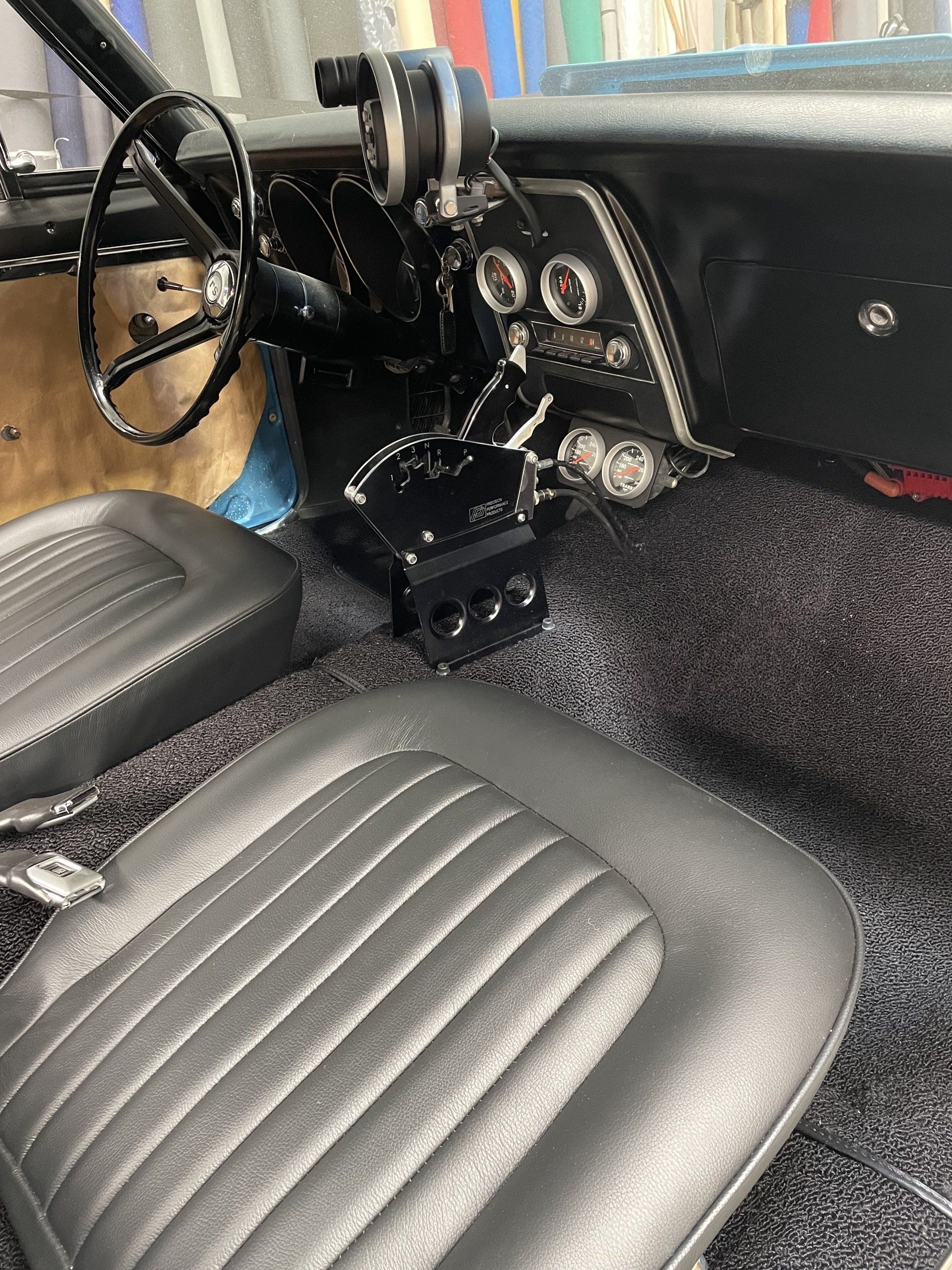 1967 Camaro black leather front seat and floor carpet
