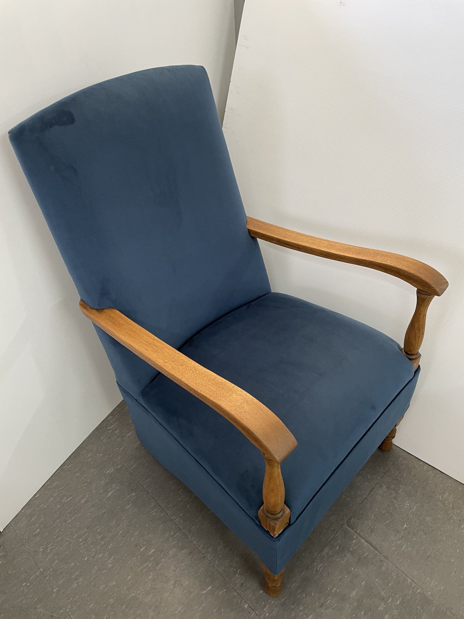 Antique rocker in blue velvet