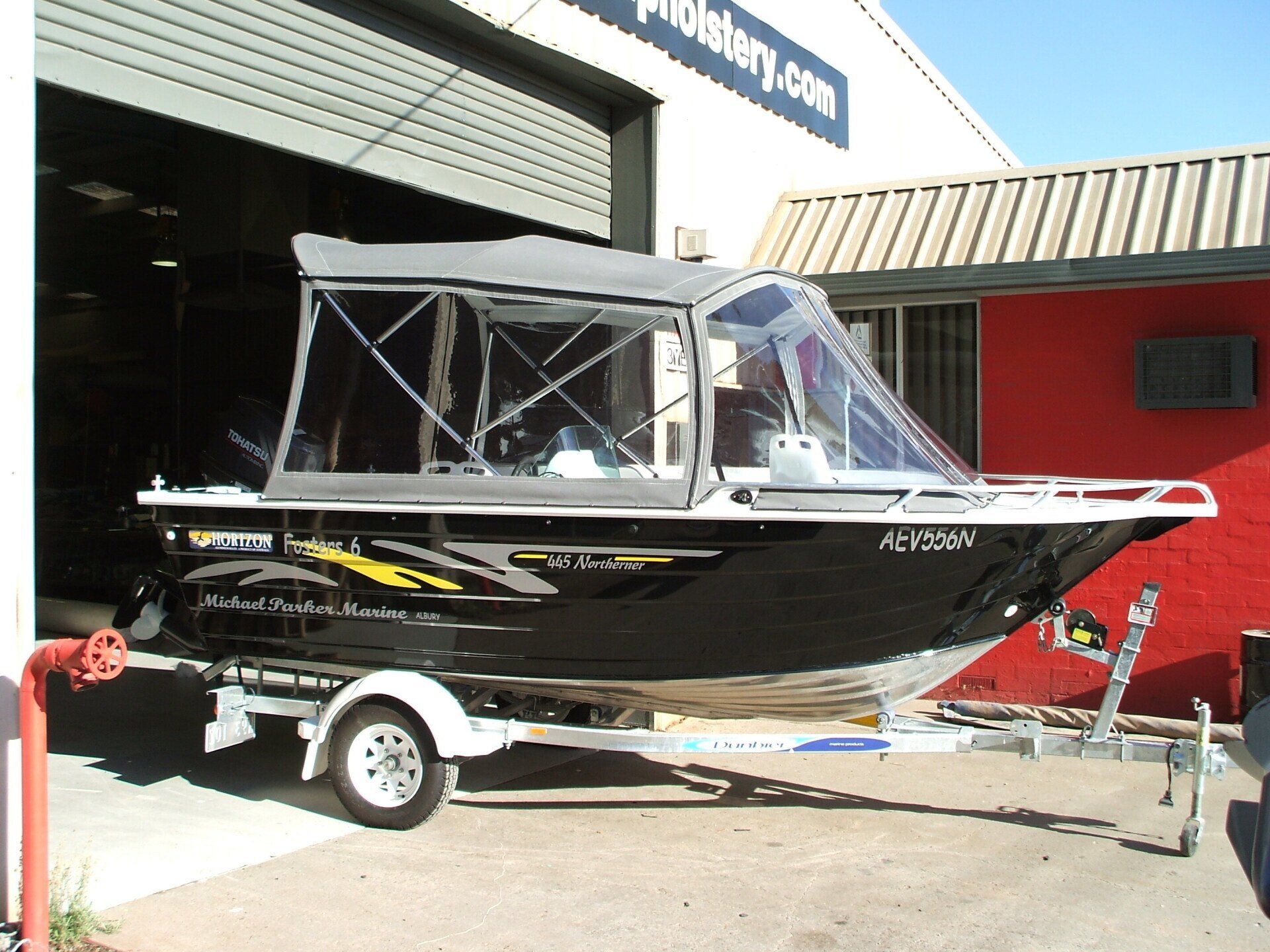 Bimini With Clear Front and Side Curtains With Zips