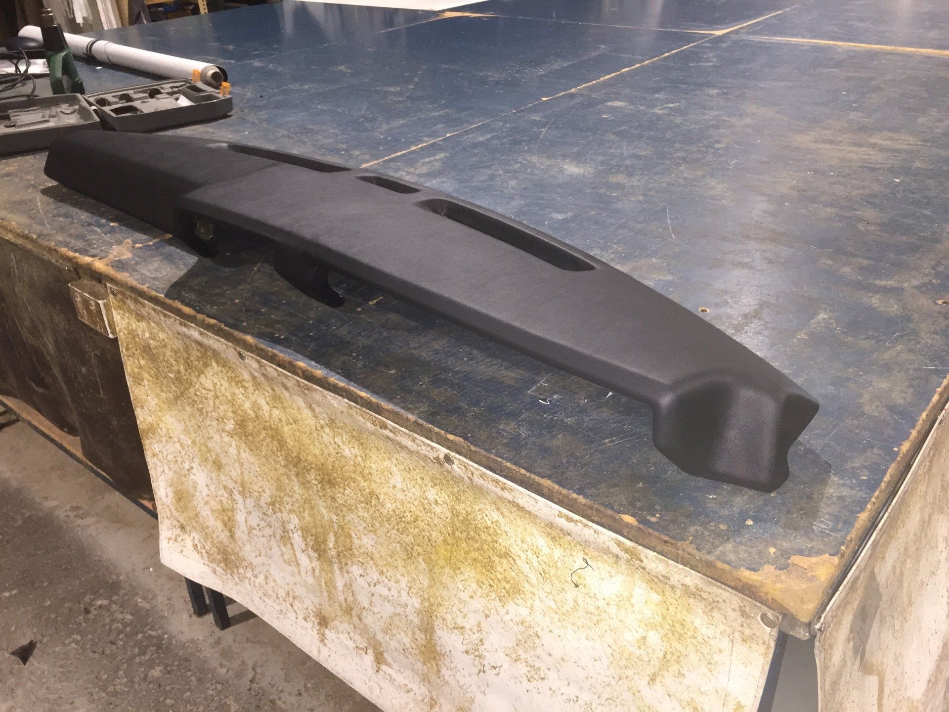 Black vinyl wrapped dash