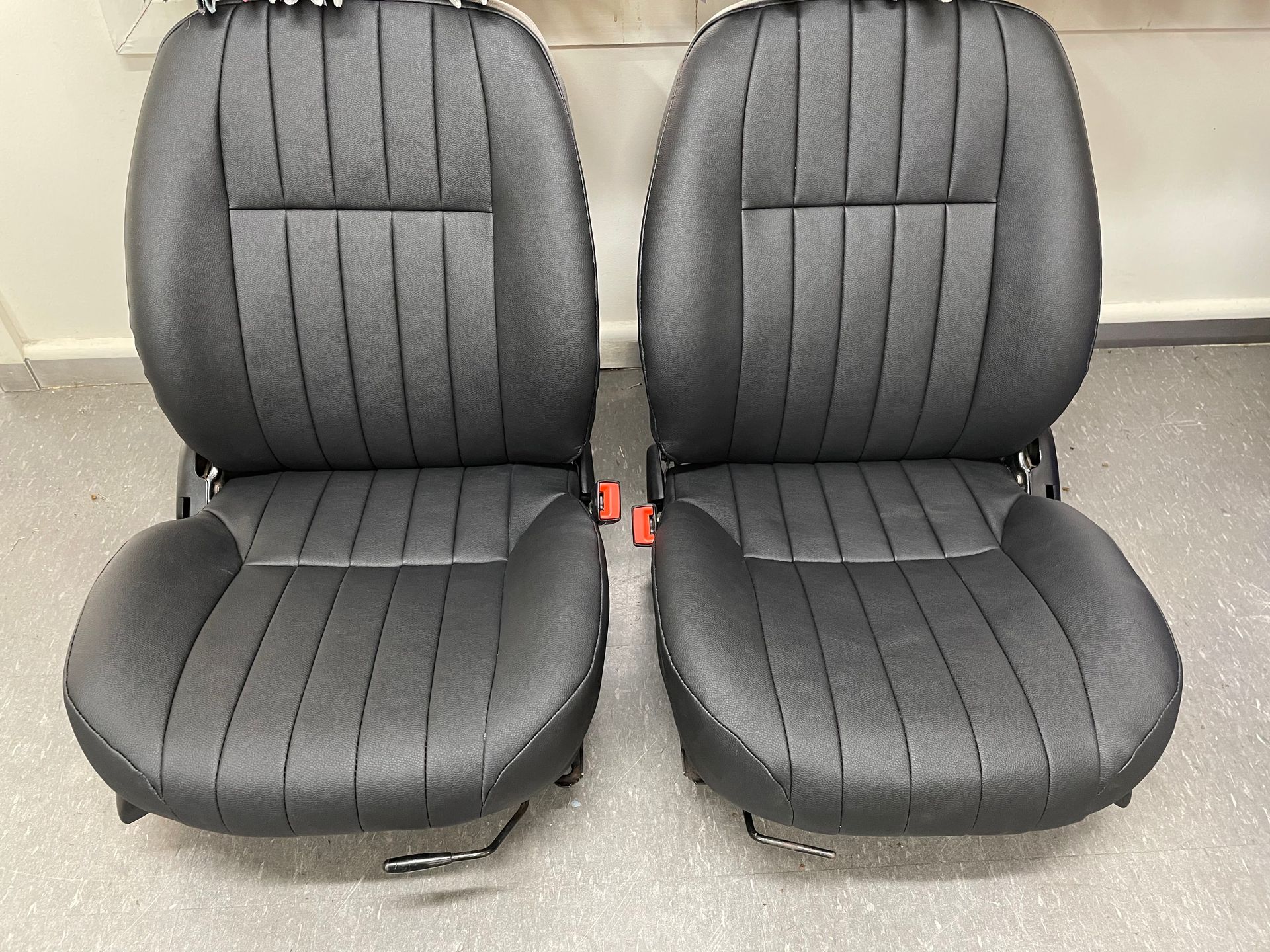 Black leather bucket seats