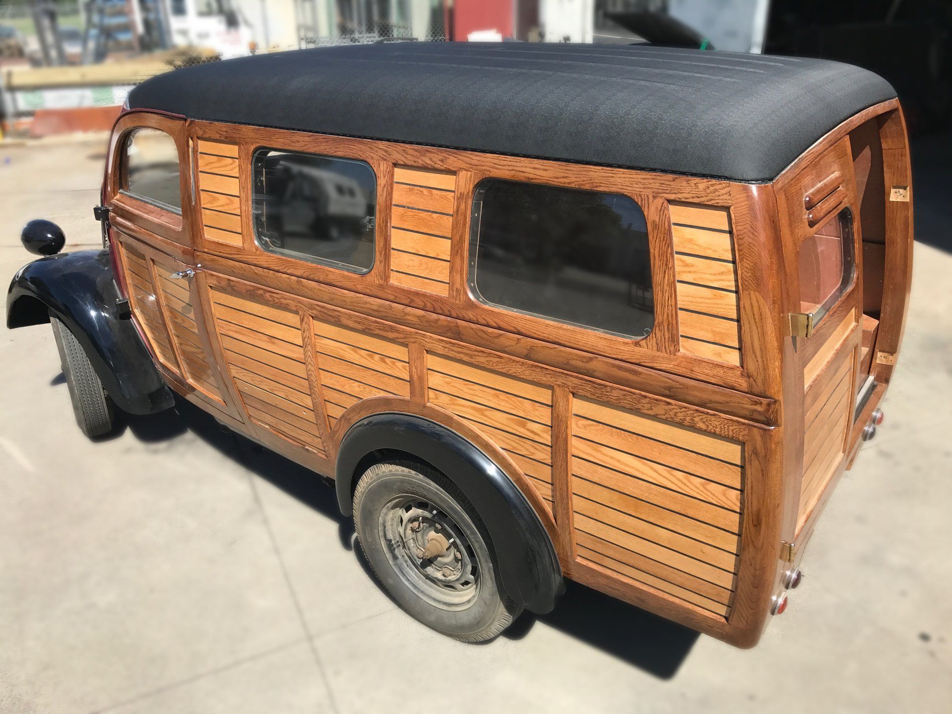 Black vinyl roof on timber panelled van