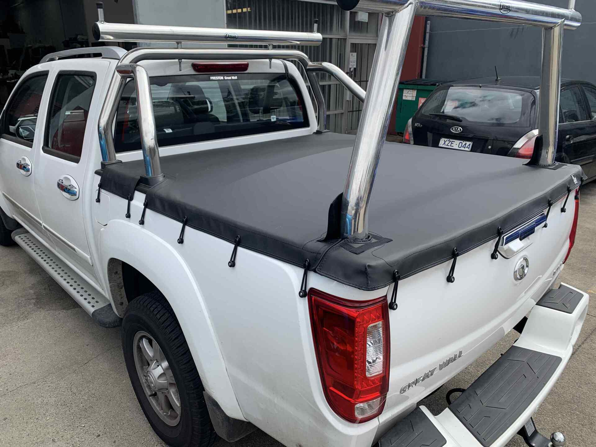 Bunji style tonneau for a Great Wall Steed - six posts cut outs with flaps to cover rear bar cutouts