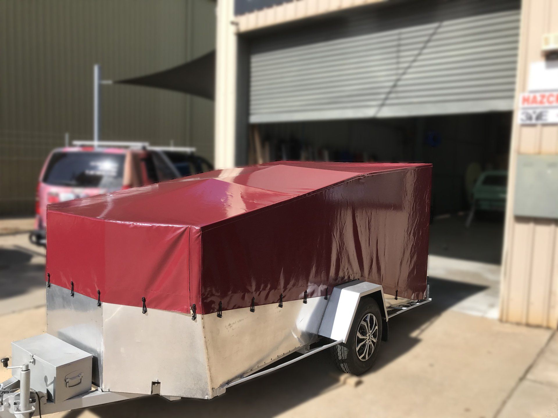 Burgundy PVC car trailer cover