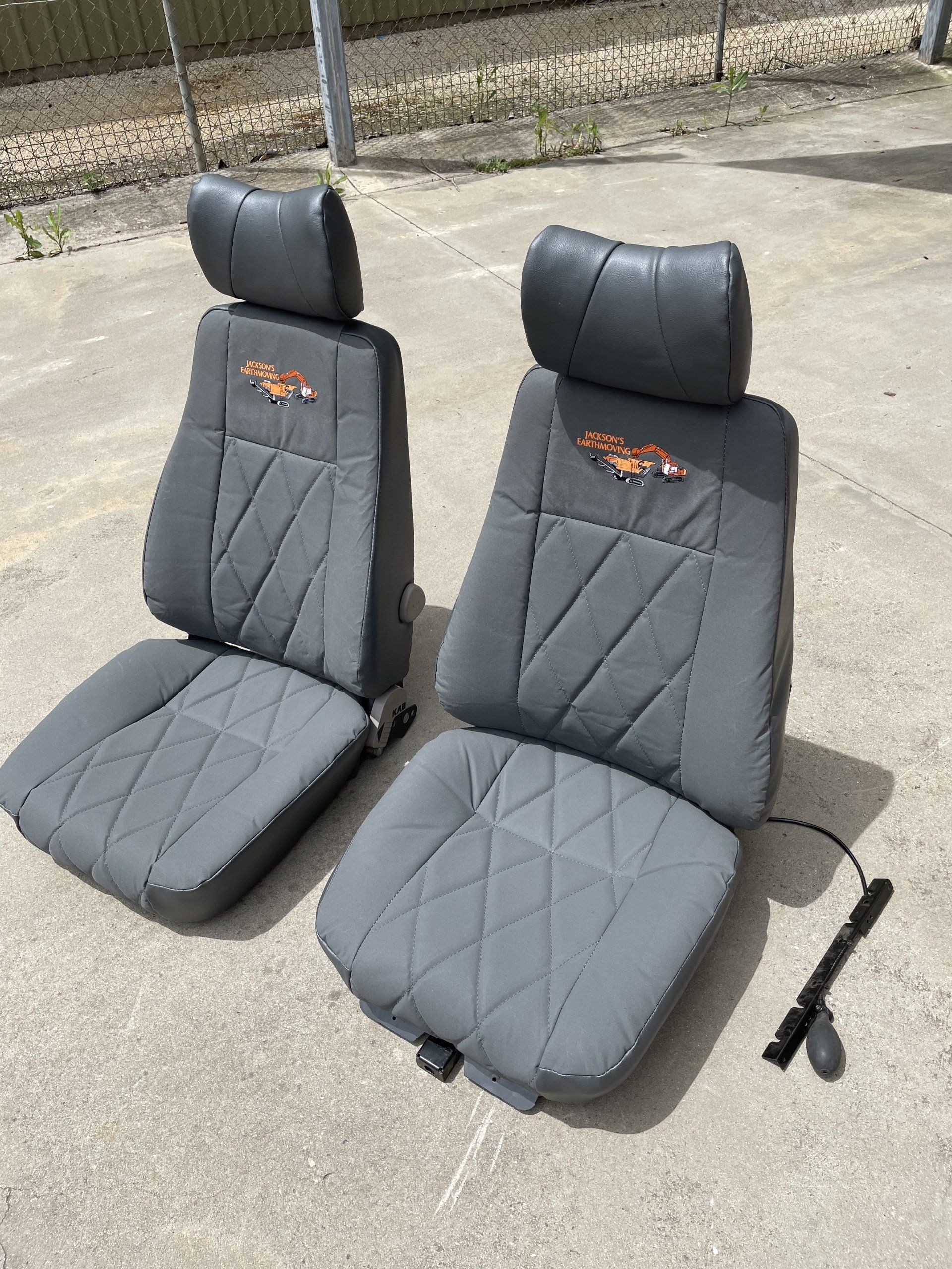 Canvas covered machine seats with embroidery