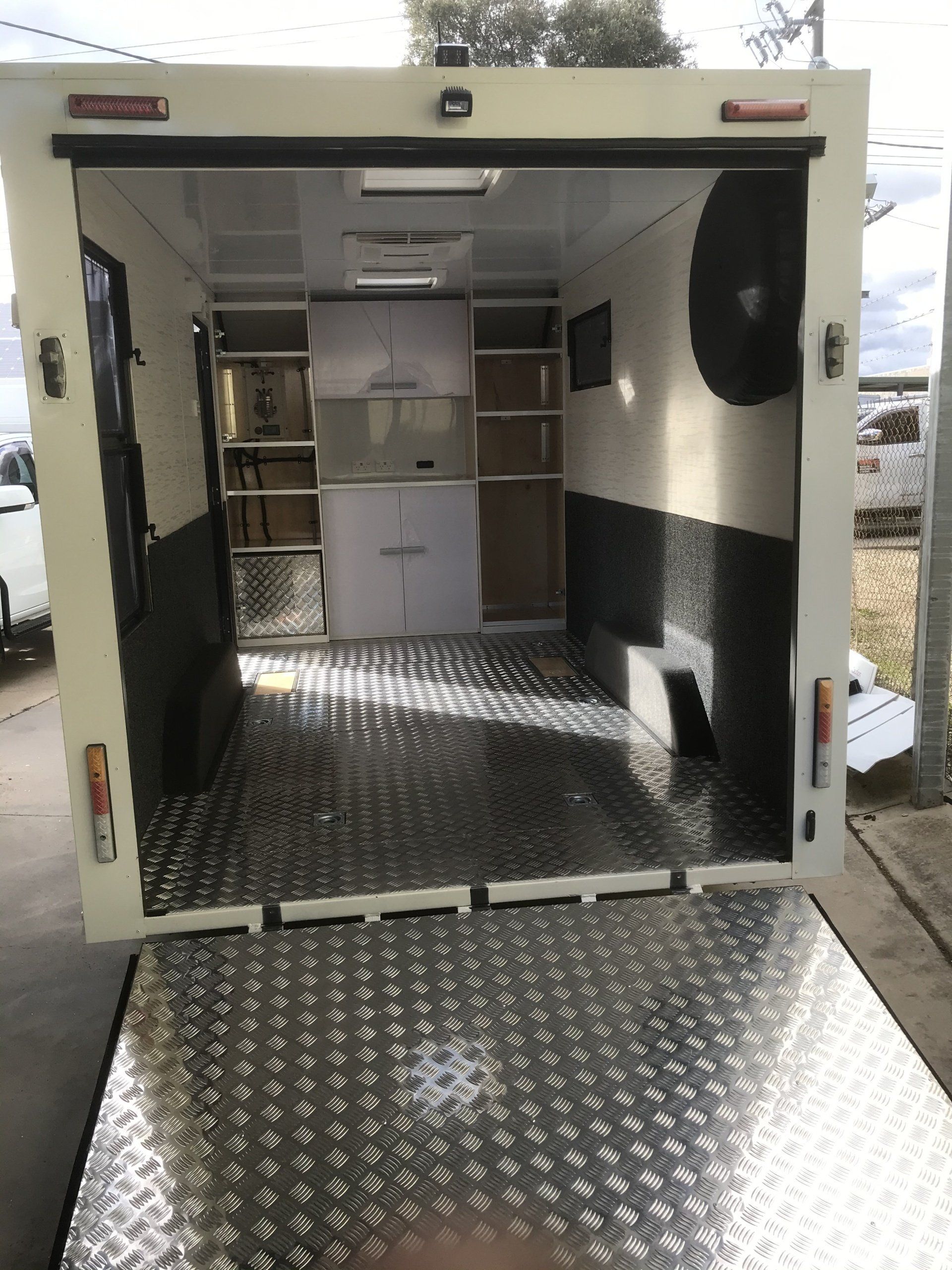 Charcoal carpet on walls and wheel arches